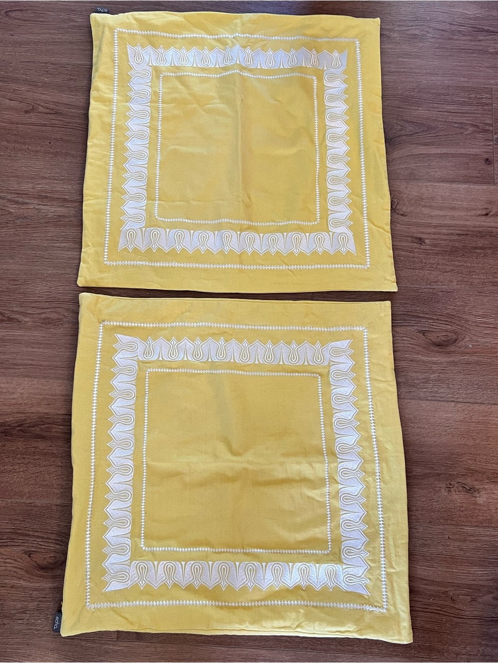 Echo Yellow Decorative Pillow Covers with White Embroidered Border